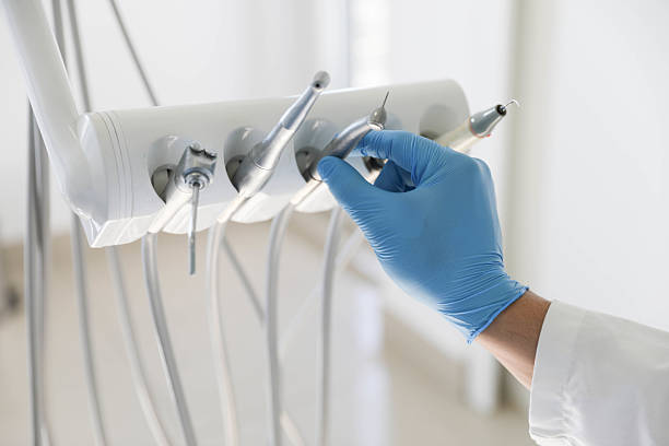 Professional Tooth Extraction technician working in Lavon, TX